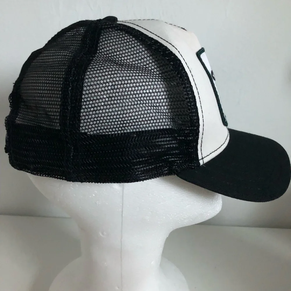 Cash Cow Black & White Cow Patch Trucker Hat
